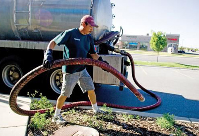 Juan, one of our Hialeah grease trap cleaning pros is working on a new job